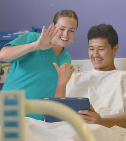 young person and nurse using the Canteen Robots service at hospital